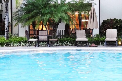 Ground-floor unit in front of lazy river pool at Pacifico in Coco