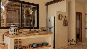 Fridge, microwave, stovetop, coffee/tea maker