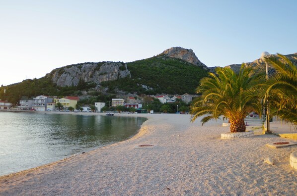 On the beach, sun loungers