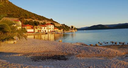 Holiday apartment on the beach, village Klek