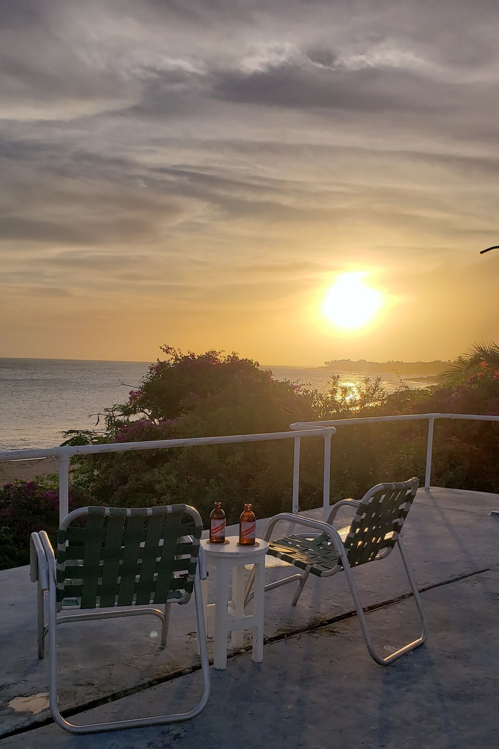 Roof-top deck sunset drinks