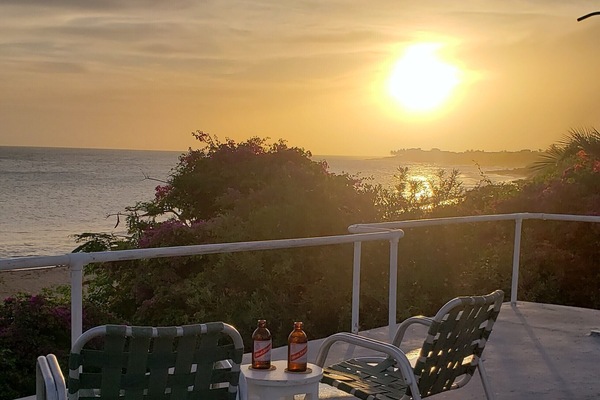 Roof-top deck sunset drinks