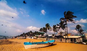 Enjoy a serene beachside retreat with access to the ocean and scenic views.