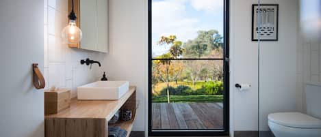 Bathtub, hair dryer, towels