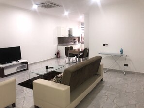 TV, fireplace - Two Bedroom Fully Furnished Apartment (Osu Klottey)