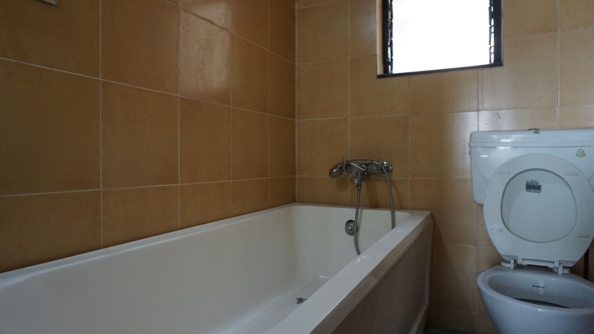 Sunlit Apartment Overlooking the City Skyline