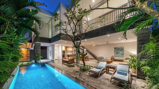 A modern house with a swimming pool, outdoor seating, and a staircase leading to a balcony. - Villa Jekumah 3 - 1 minute walk to restaurants (Kerobokan)