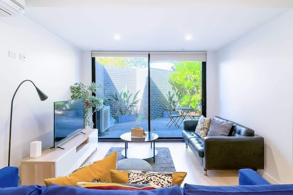 Spacious Living Room With Backyard View