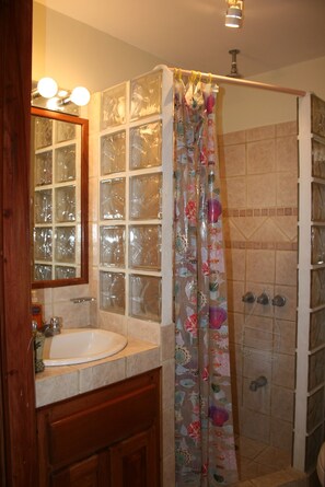 Shower, towels, soap, toilet paper