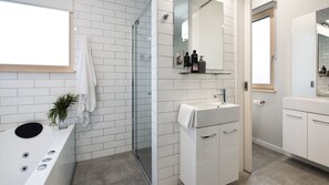 Bathtub, hair dryer, towels