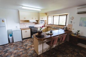 Full-sized fridge, microwave, oven, dishwasher