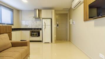 Apartamento luxo | Área de estar | Smart TV, Netflix