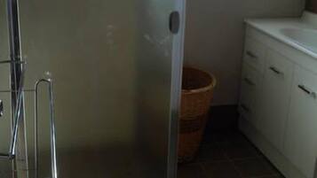 Shower, hair dryer, towels, toilet paper