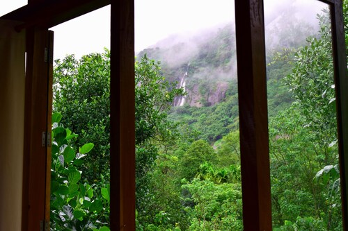 Wooden cottage in the middle of nature