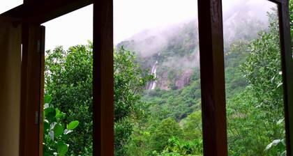 Wooden cottage in the middle of nature
