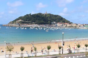 On the beach, sun loungers, beach towels