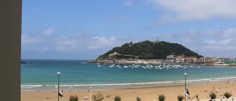 On the beach, sun-loungers, beach towels