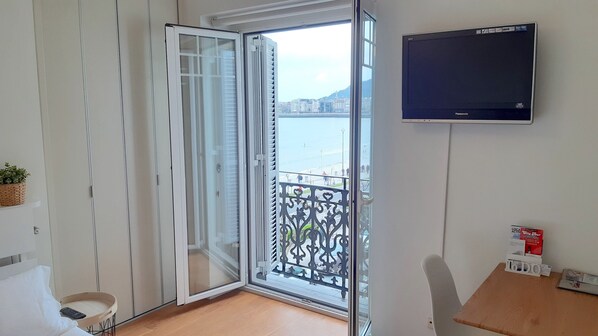 Iron/ironing board, travel crib, free WiFi, bed sheets