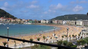 On the beach, sun-loungers, beach towels