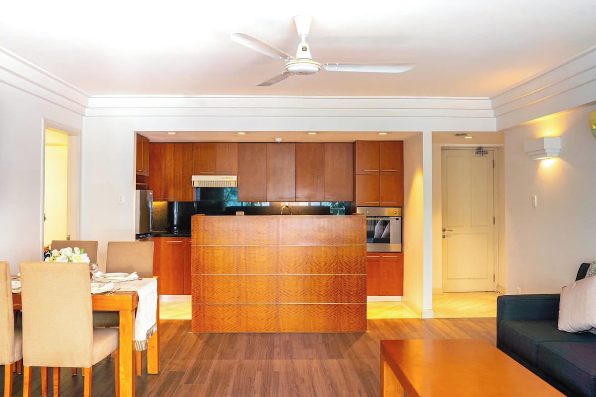 Deluxe Apartment, 2 Bedrooms | Living area | 32-inch TV with cable channels