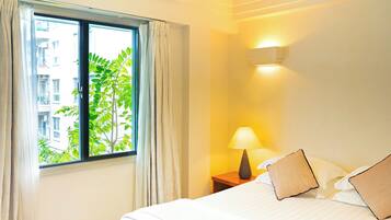 Deluxe Apartment, 2 Bedrooms | Hypo-allergenic bedding, in-room safe, desk, blackout drapes