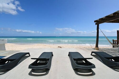 Luxury Beachfront Villa with a Pool & Deck in guard-gated Playacar