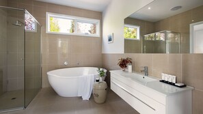 Shower, jetted bath, hair dryer, towels