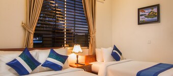 Angkor Sunshine is a fist floor private villa with 3 rooms, large sitting area.