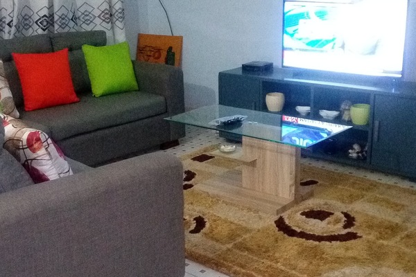 Get to relax in the cosy living room.