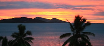 Relax and unwind in paradise - absolute beach front holiday home