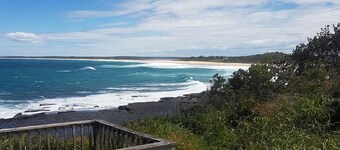 Let the waves hit your feet, let the sand be your seat!!
beach across the road! 