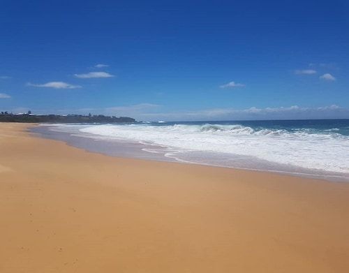 Let the waves hit your feet, let the sand be your seat!!
beach across the road! 