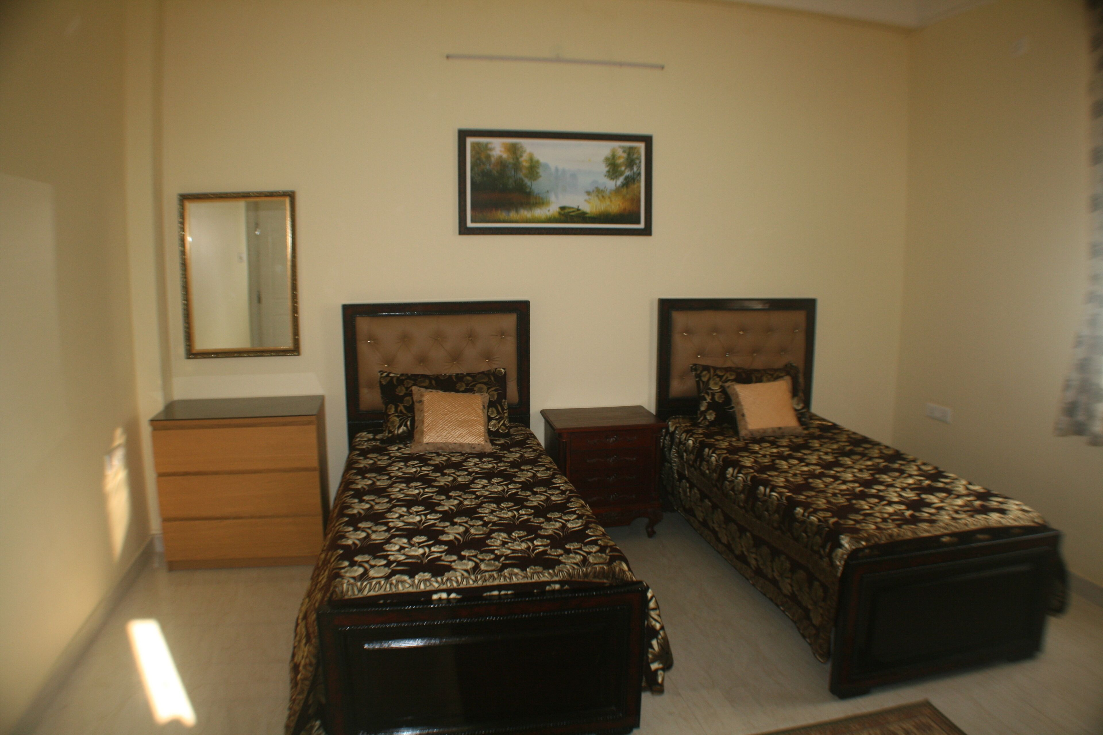 3 BHK Beautifully Furnished Apartment with Kitchen and attached Bath rooms.