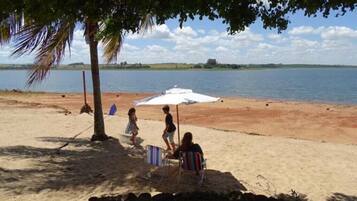 On the beach, sun loungers