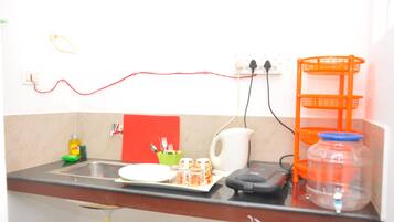 Fridge, stovetop, electric kettle, toaster