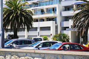 Zoom shot showing apartment (with round mirror on left balcony + RHS balcony)
