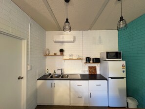 Fridge, microwave, toaster, cookware/dishes/utensils