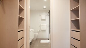 Bathtub, hair dryer, towels