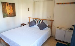 1 habitación, tabla de planchar con plancha, internet y ropa de cama 
