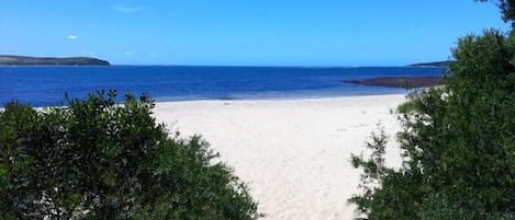 On the beach, beach towels