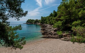 On the beach, sun loungers, beach towels