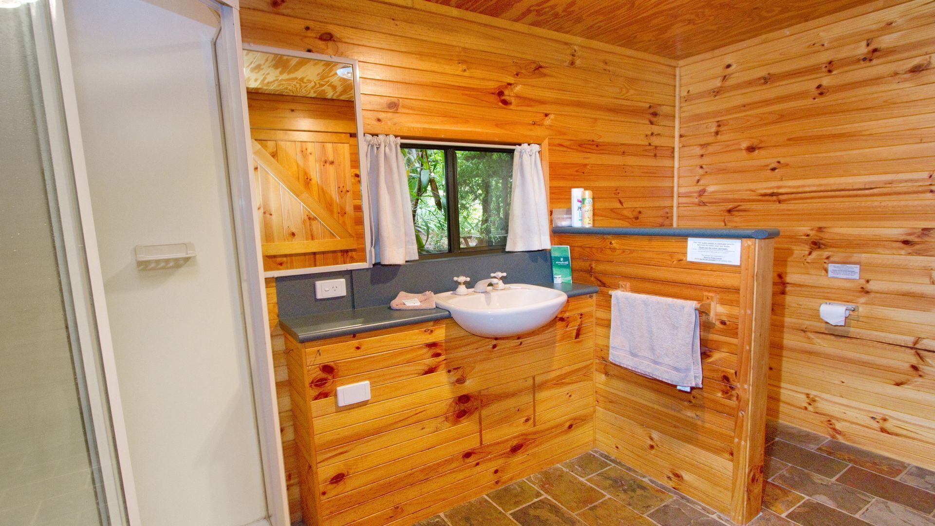 Self-contained timber cottage in the rainforest perfect for families.