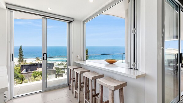 Enjoy ocean views from the balcony with a sliding glass door.
