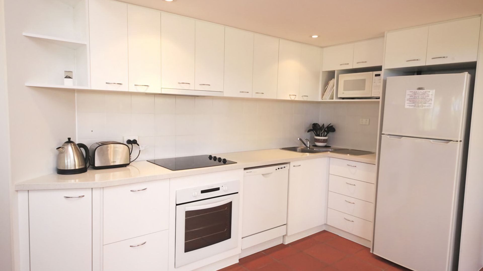 Coffee/tea maker, fridge, microwave, oven