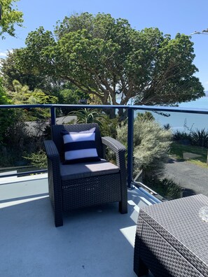 Property grounds - Harbour views from super spacious upstairs apartment. Fully equipped. (Onerahi)