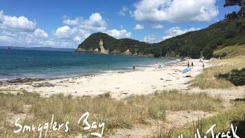 On the beach, sun-loungers, beach towels