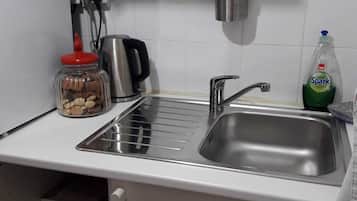 Fridge, microwave, electric kettle, toaster