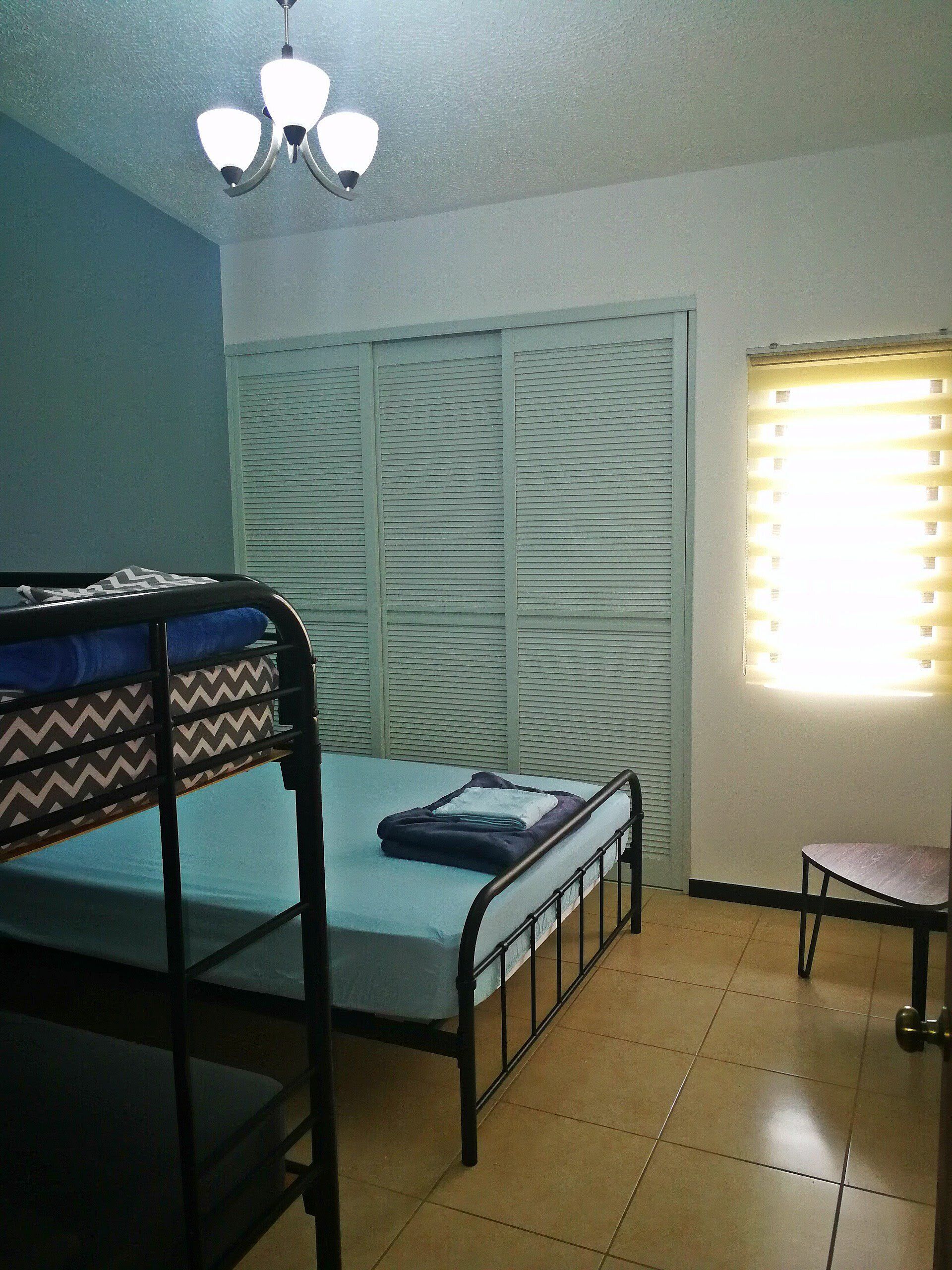 Comfy, modern and secure spot in gated community near airport and city