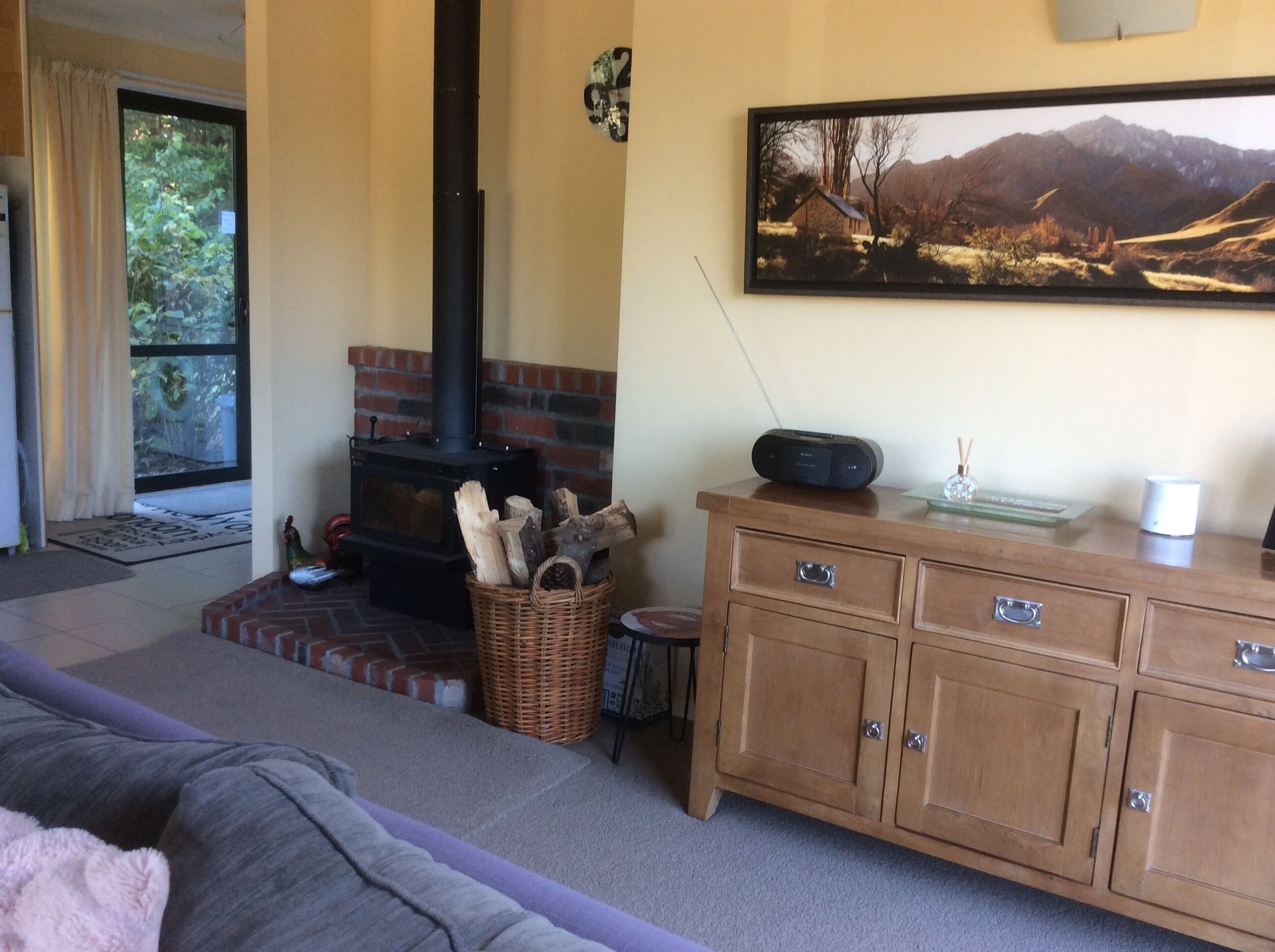 Flat-screen TV, fireplace, DVD player, toys