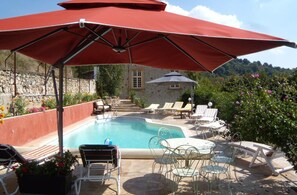 Outdoor pool, a heated pool - Château de Charfetain farm in the heart of the Monts du Lyonnais (Brullioles)